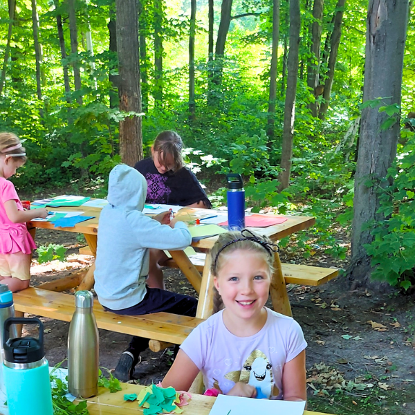 Children learning about honeybees through arts and crafts