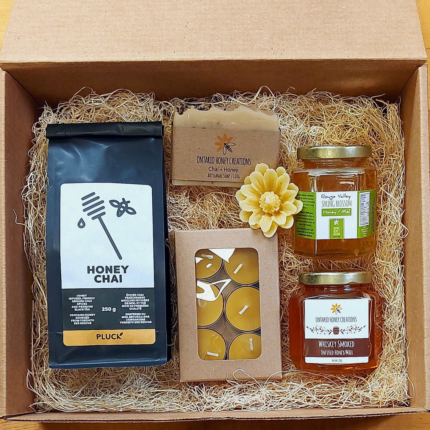 Gift box with Honey Chai Tea, Beeswax Tealight Candles, Chai Honey Soap, Whiskey Smoked Honey, and Rouge Valley Spring Honey