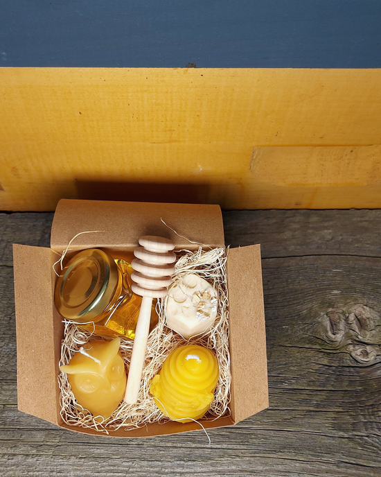 Mini gift set with Honey Favour, honey dipper, small beeswax candles, and mini soap. 