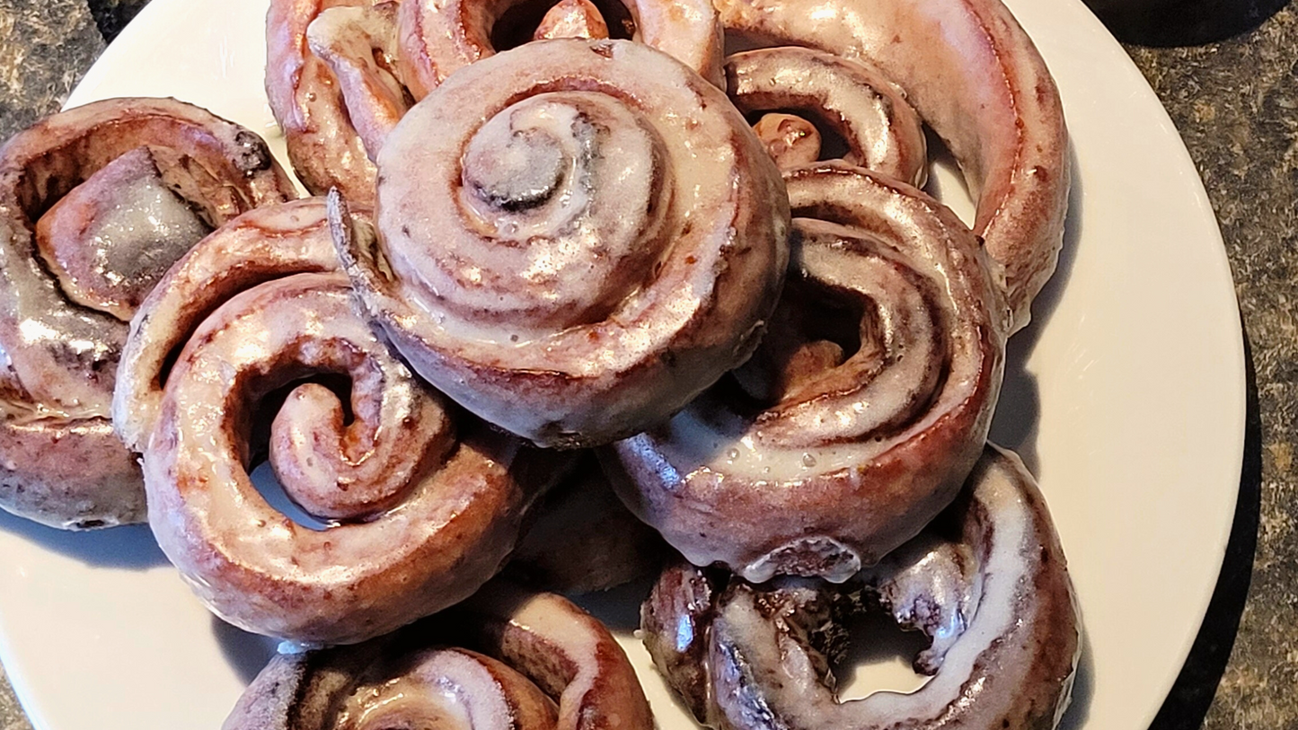 Pile of glazed honeybuns. 