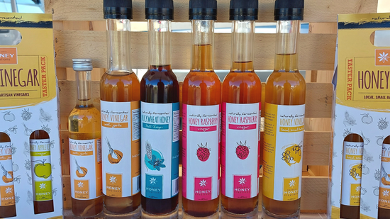 Honey Vinegar bottles with flavours garlic, raspberry, and buckwheat