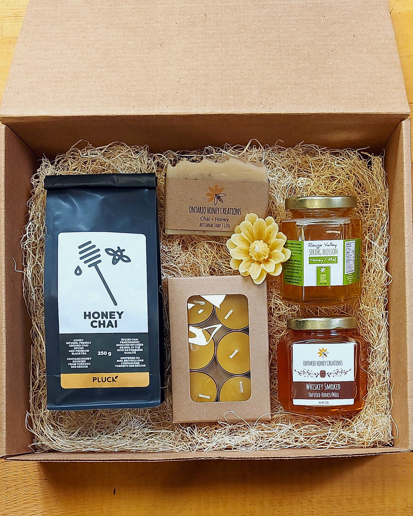 Gift box with Honey Chai Tea, Beeswax Tealight Candles, Chai Honey Soap, Whiskey Smoked Honey, and Rouge Valley Spring Honey