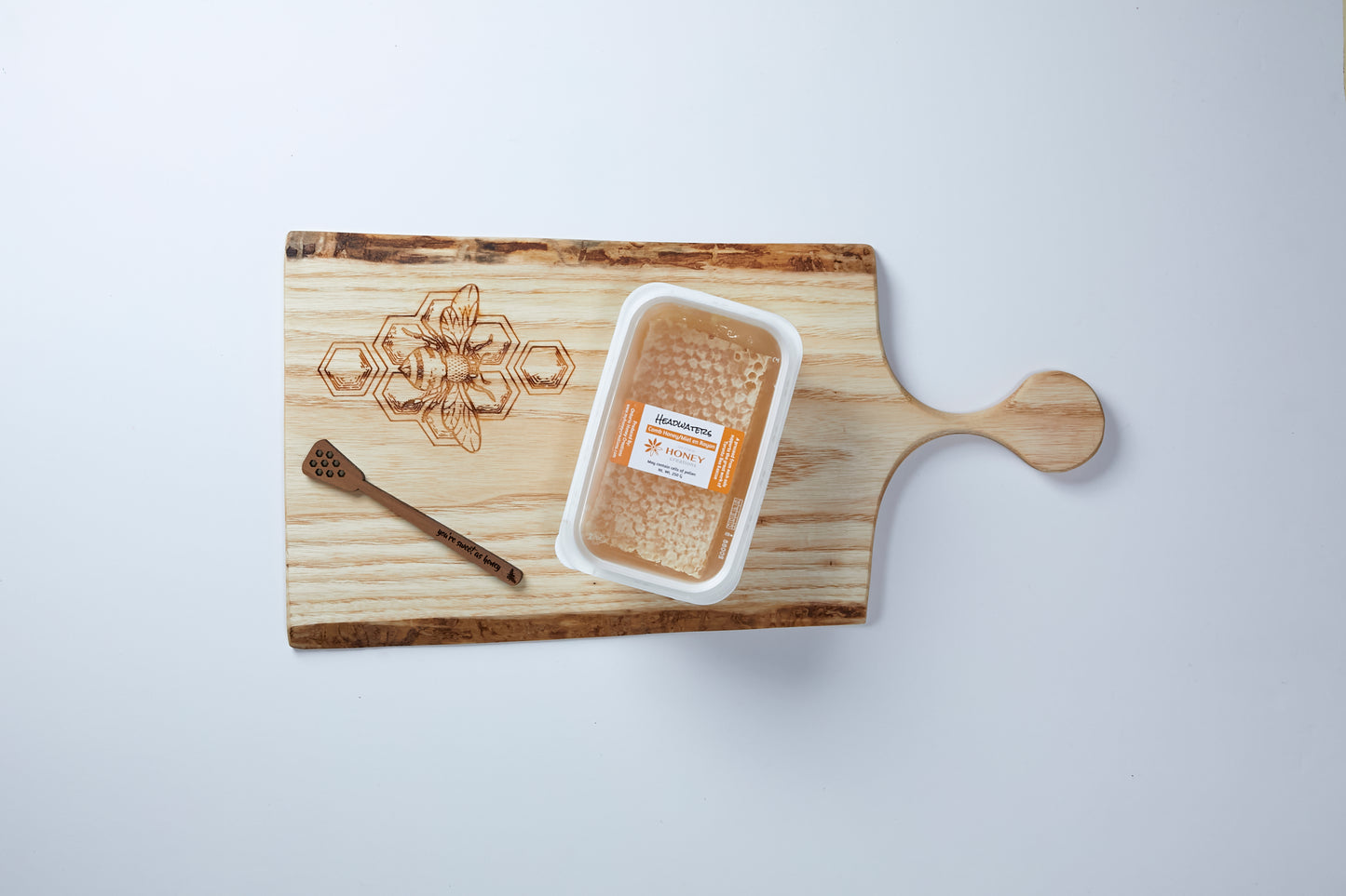 Wooden Charcuterie Board with Honeycomb and wooden dipper